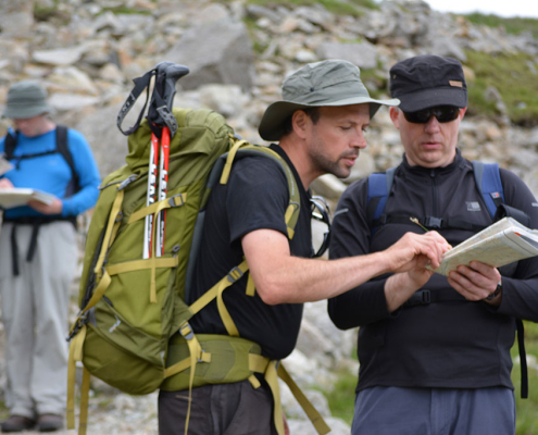 Pointing at maps on a Mountain Skills course