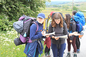 a DofE group reading a map a DofE group reading a map
